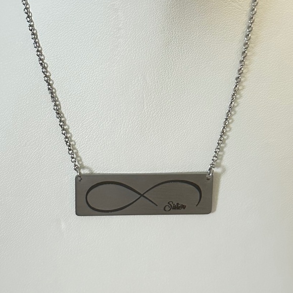 Silver tone rectangular plate on chain w/etched infinity symbol says “Sister” - Picture 4 of 15